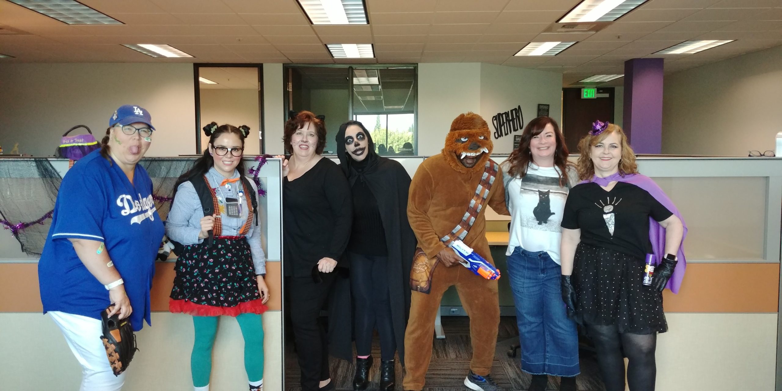 decisely employees dressed up for halloween